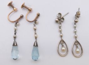 Two pairs of seed pearl earrings. The largest 2.5 cm high.