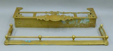 Two Victorian brass fenders. The largest 119 cm long.
