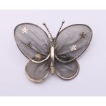 A filigree butterfly brooch. 5.5 cm wide.