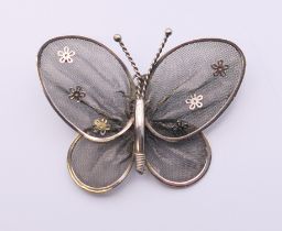 A filigree butterfly brooch. 5.5 cm wide.