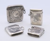 Four silver vesta cases, hallmarked Birmingham 1910, 1913 and 1920, and Chester 1908. The largest 4.