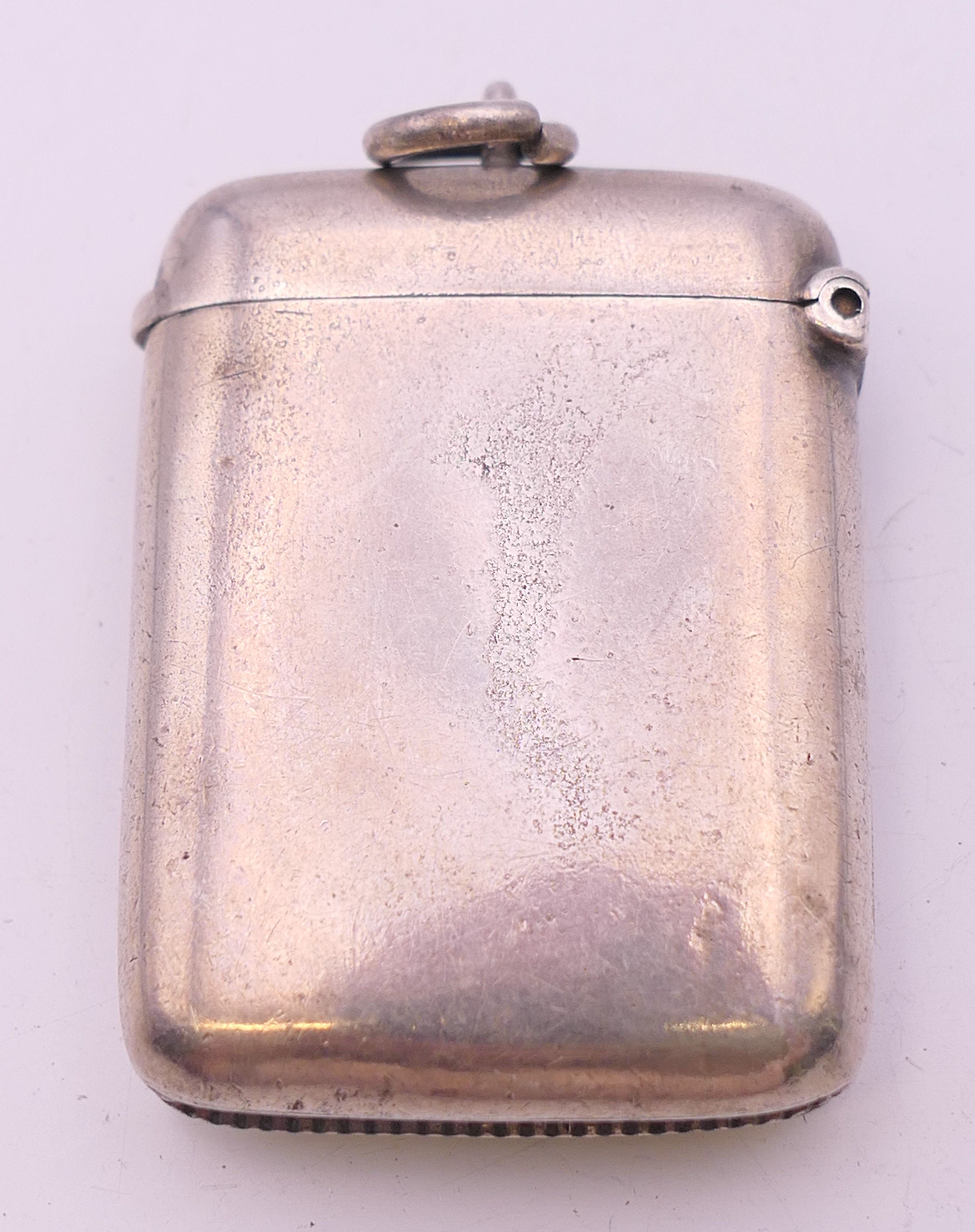 A Victorian silver vesta fob, Birmingham 1899, maker's mark Deakin and Francis Ltd. 3 cm wide. - Image 2 of 5