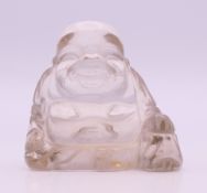 A rock crystal model of Buddha. 3.75 cm high.