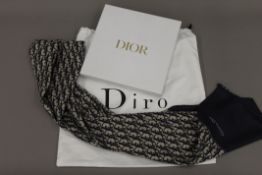 A Christian Dior silk scarf in box, in dust bag. The scarf 196 cm long.