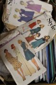 A quantity of vintage fashion sewing patterns.