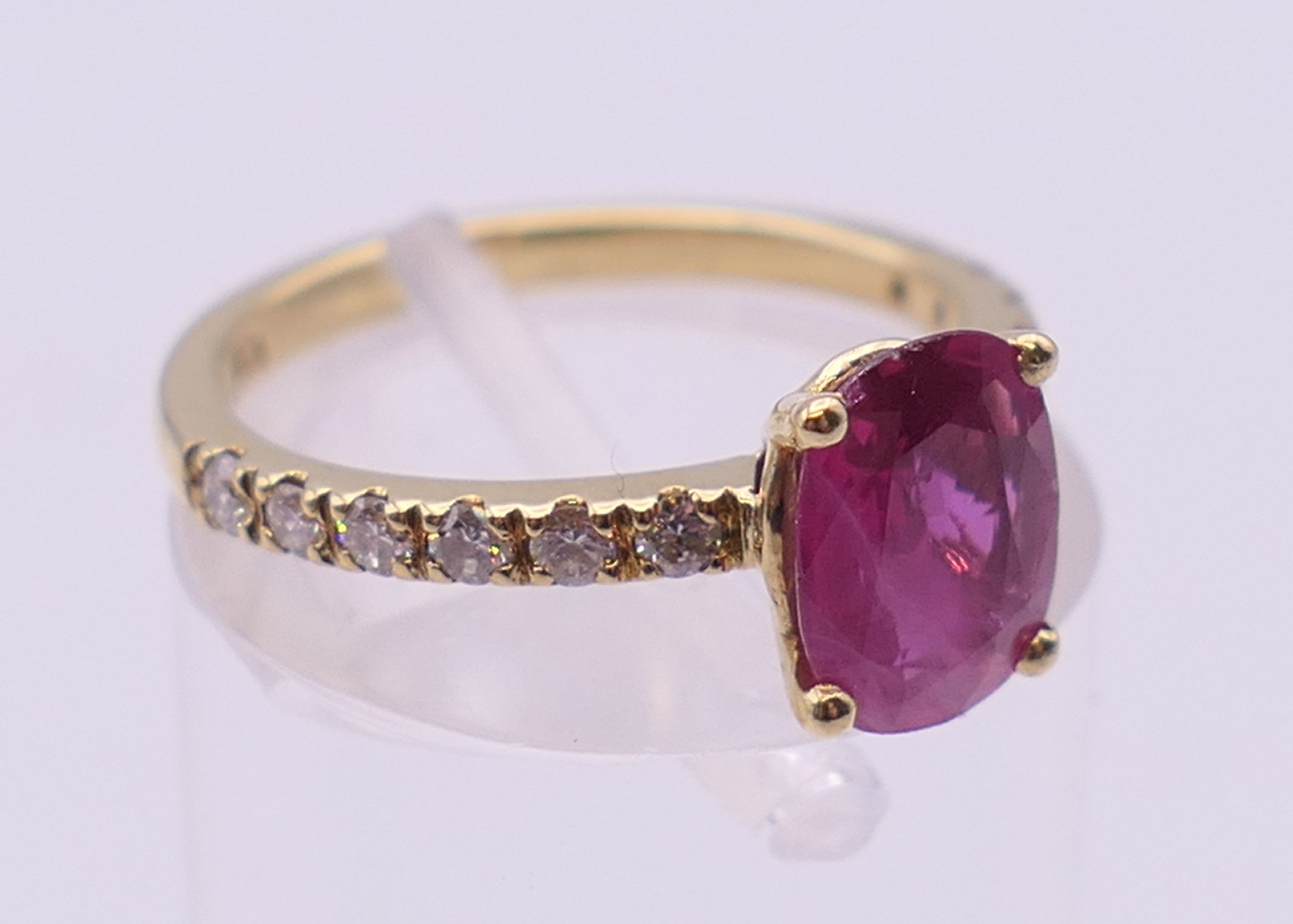 An 18 ct gold ruby and diamond ring. Ring size I. - Image 2 of 4