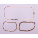 A 9 ct gold necklace and two 9 ct gold bracelets. The former 36 cm long. 14.8 grammes.