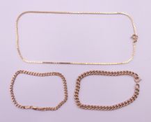 A 9 ct gold necklace and two 9 ct gold bracelets. The former 36 cm long. 14.8 grammes.