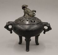 A 19th century Chinese bronze censer. 24 cm wide.