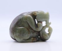 A jade beast and duck figure. 7 cm long.