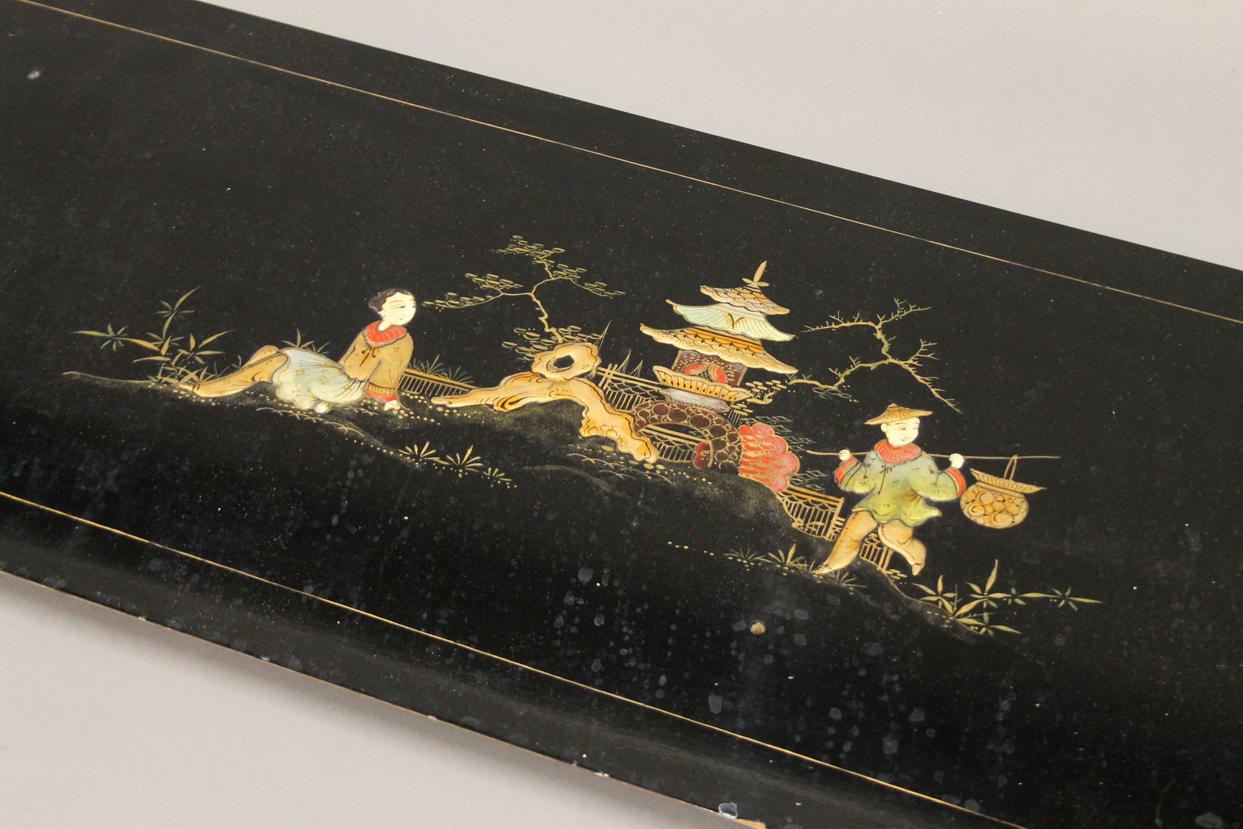 A chinoiserie lacquered panel. 136.5 cm long. - Image 3 of 3