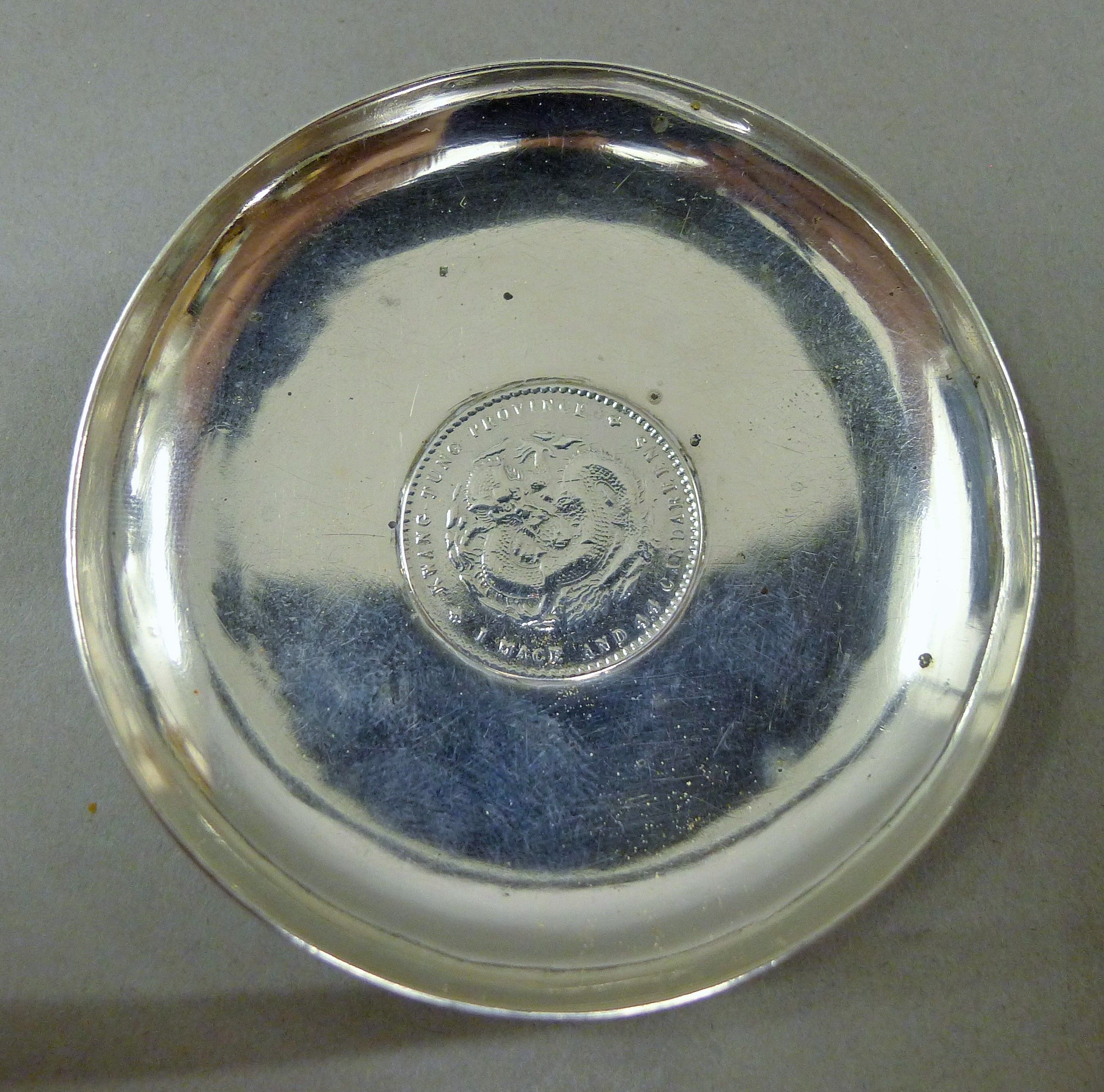 Two small Chinese silver dishes, one set with a coin. The largest 9 cm diameter. 88. - Image 2 of 7