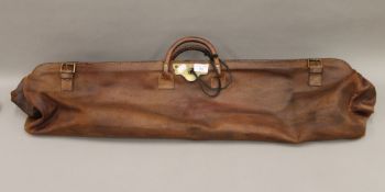 A leather cricket bag. 95 cm long.