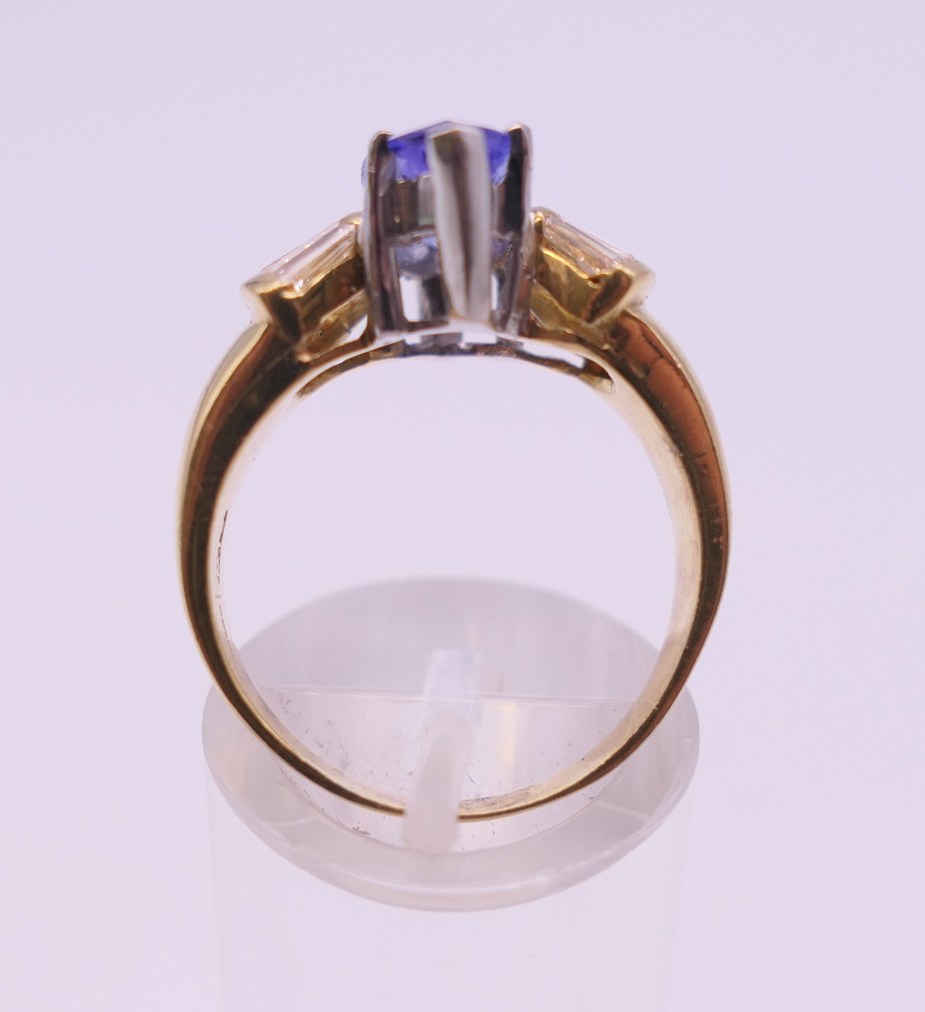 An 18 ct gold tanzanite and baguette diamond ring. Ring size O/P. - Image 4 of 8