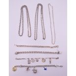 A quantity of silver necklaces and bracelets. 177.5 grammes.
