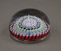 A Whitefriars paperweight, dated 1976. 7.5 cm diameter.