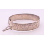 A silver bangle, makers mark RPH. 6 cm internal width. 55.2 grammes.