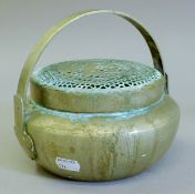A 19th century Chinese Paktong lidded censer and handle. 18.5 cm wide.