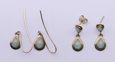 Two pairs of 9 ct gold jade earrings. The largest 2 cm high.
