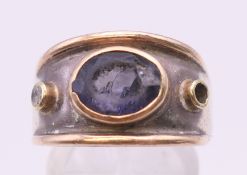 A Gage style silver ring. Ring size N/O.