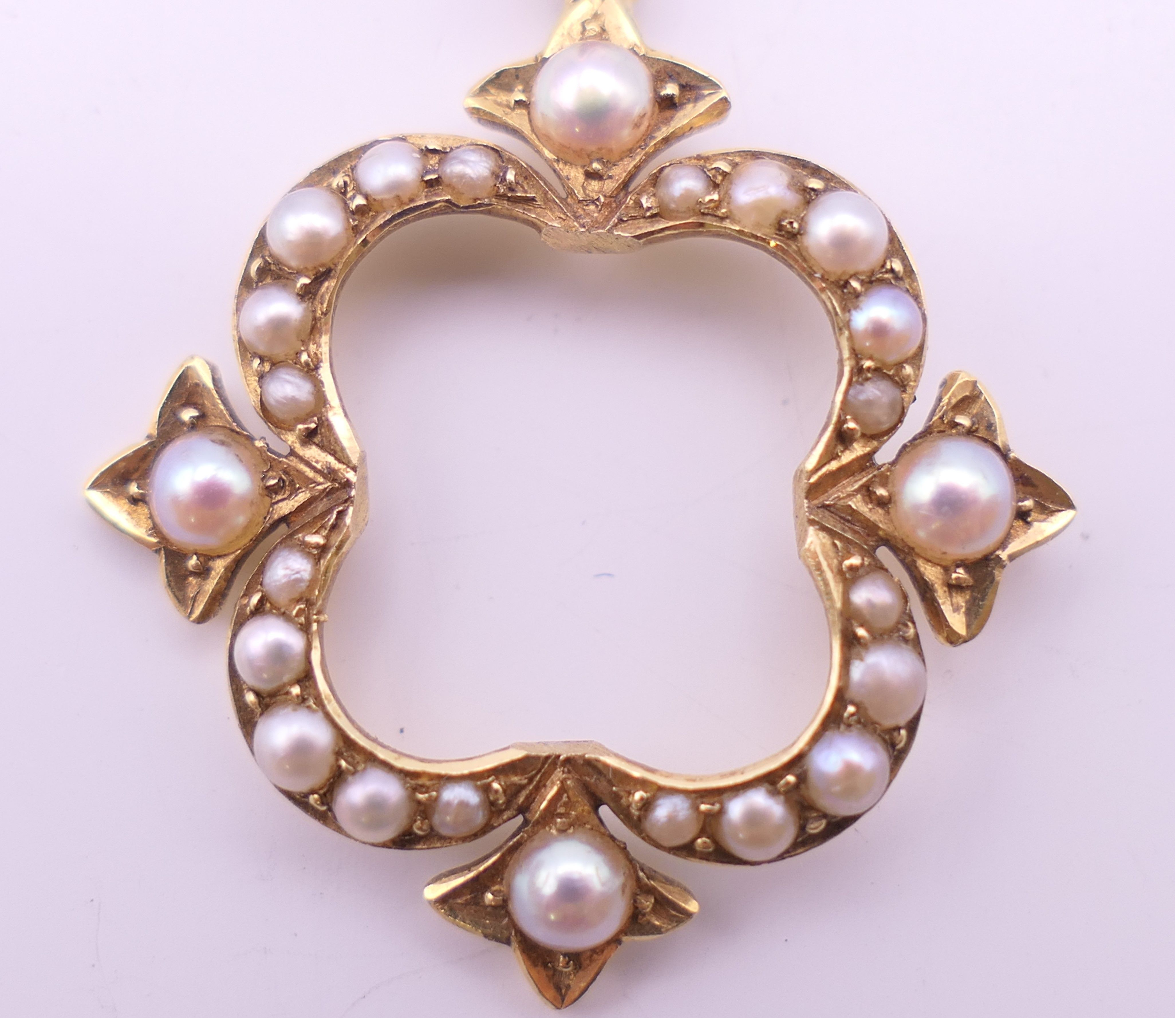 A Victorian 15 ct gold seed pearl pendant. 2.5 cm high. - Image 3 of 5