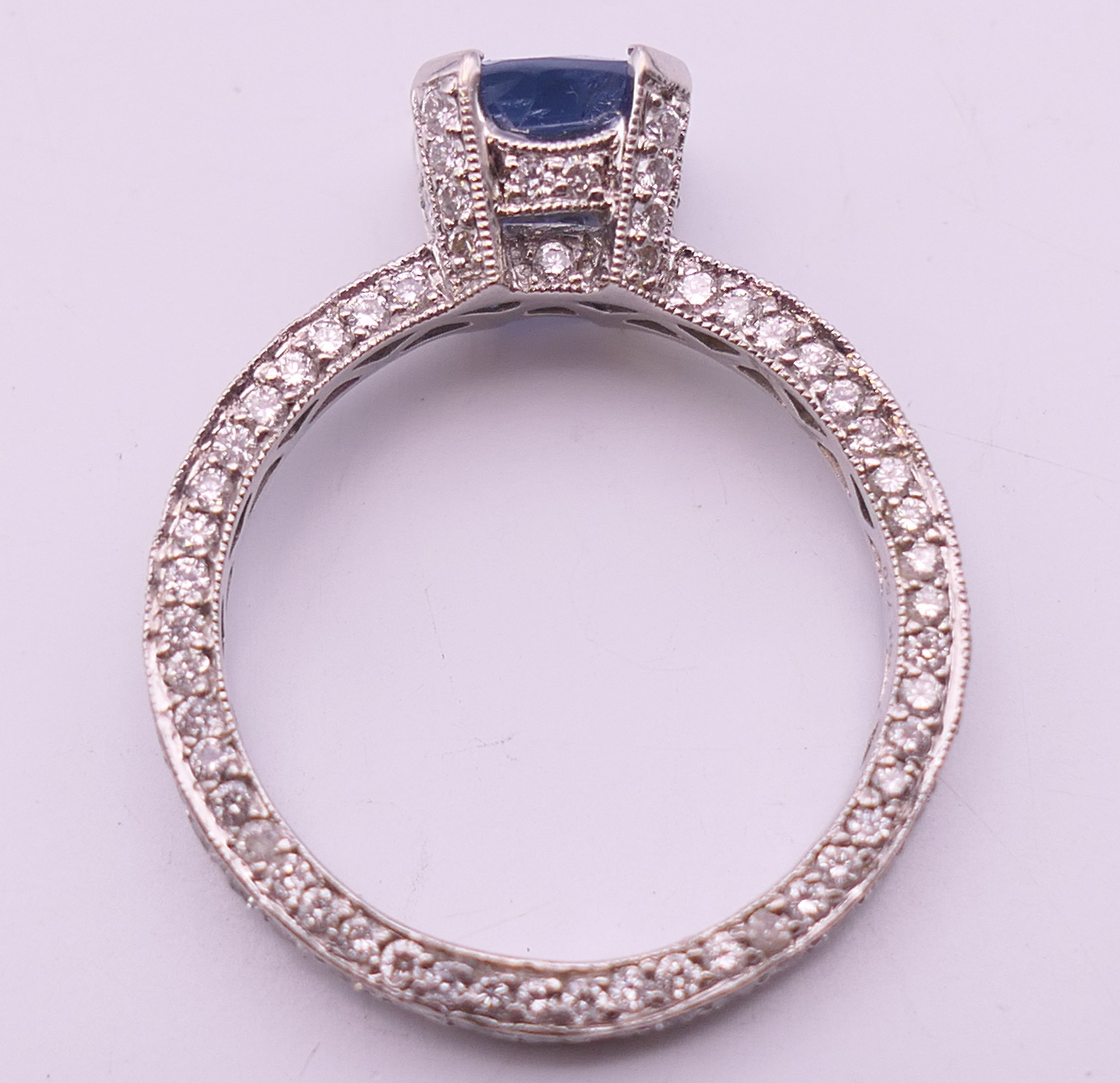 An 18 ct gold sapphire and diamond ring. Total diamond weight approximately 2.5 carats. - Image 7 of 11