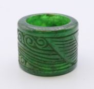 A carved archer's ring. 2.5 cm high.