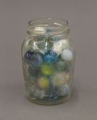 A collection of vintage buttons and marbles.