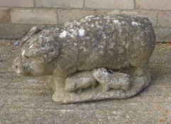 A garden statue of a pig and piglets. 49 cm long.