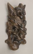 An Eastern wooden carving. 35 cm high.
