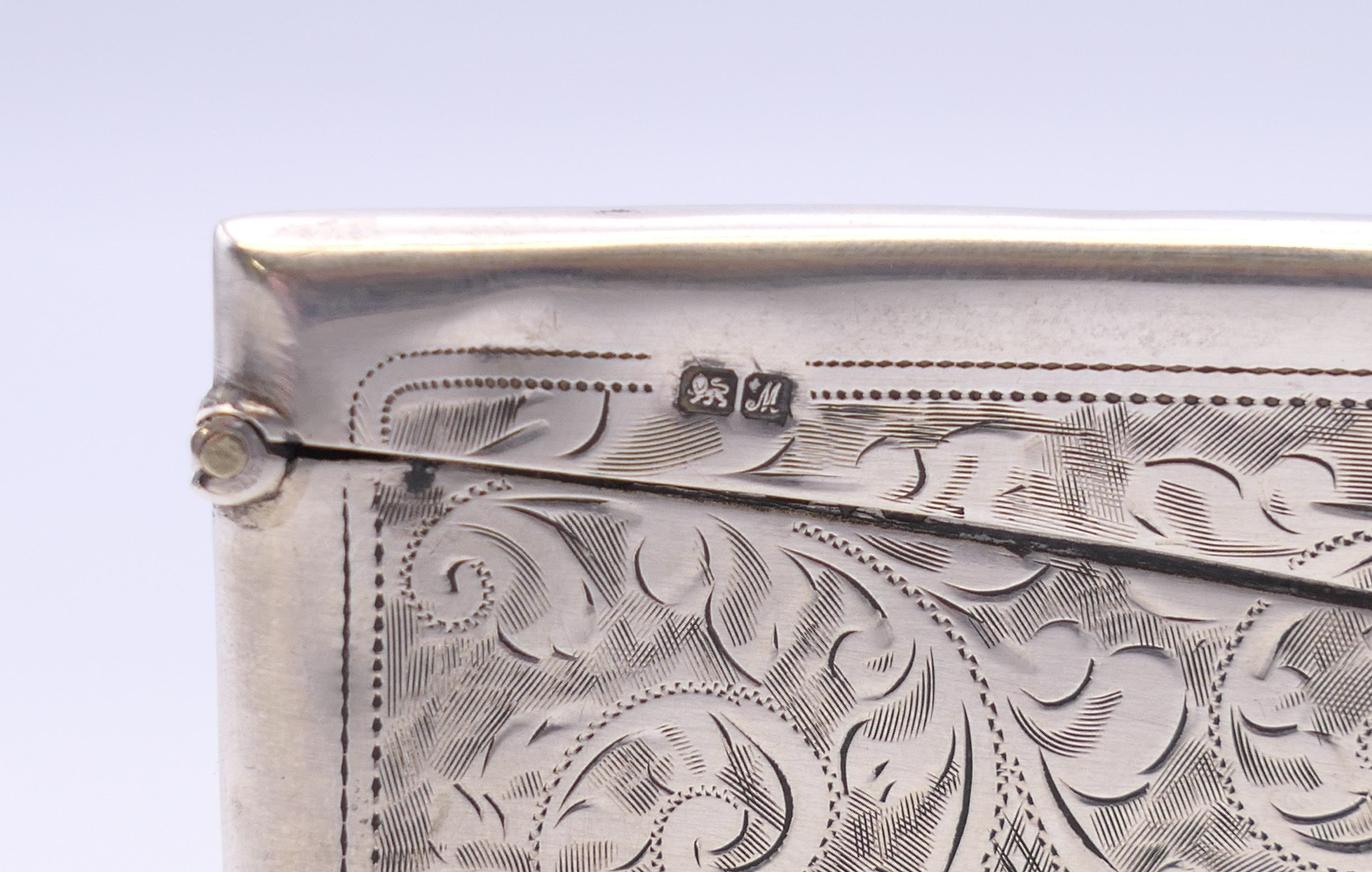 A silver visiting card case, hallmarked Chester 1912. 8 cm long. - Image 4 of 6