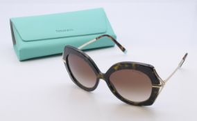 A pair of Tiffany & Co sunglasses, in case and outer box.