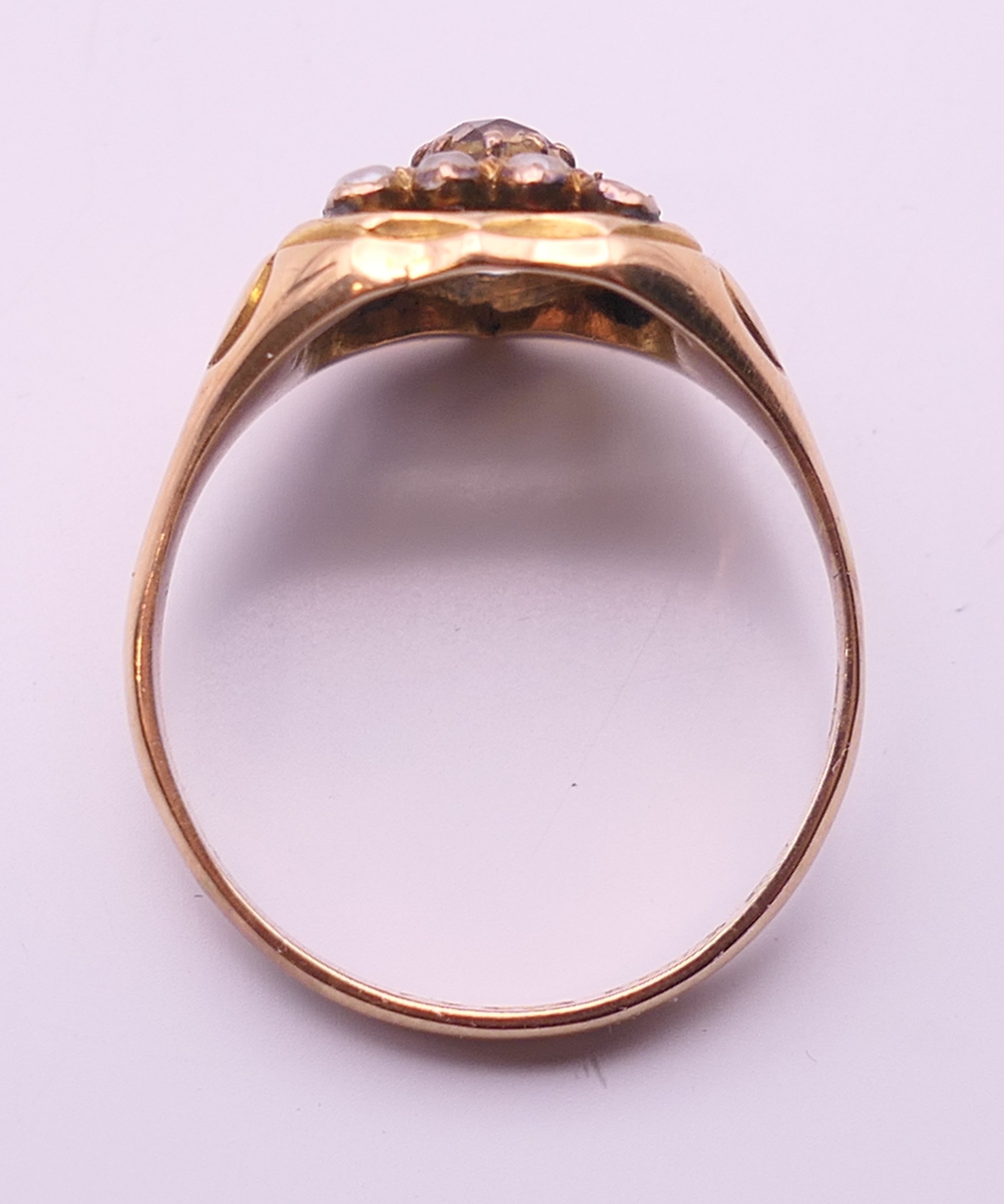 A 15 ct gold Imperial topaz and seed pearl ring, hallmarked 625. Ring size R/S. 4. - Image 5 of 5