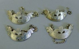 Four silver decanter labels - two Sherry and two Port. Each 5.5 cm wide.