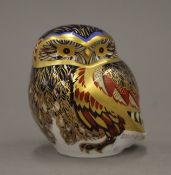 A Royal Crown Derby owl form paperweight. 8 cm high.