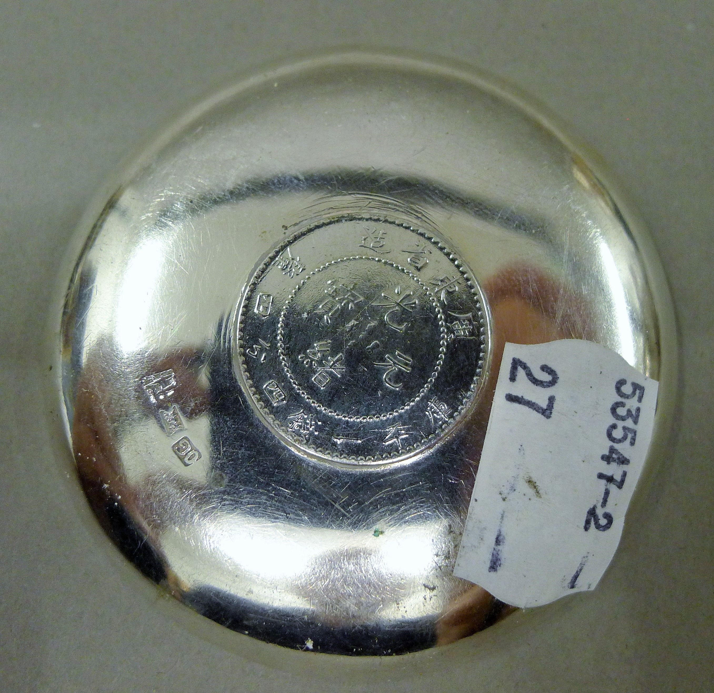 Two small Chinese silver dishes, one set with a coin. The largest 9 cm diameter. 88. - Image 3 of 7