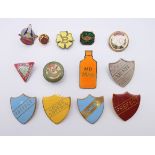 A quantity of enamel badges.