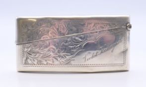 A silver visiting card case, hallmarked Chester 1912. 8 cm long.