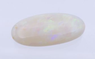 An opal specimen. 2 cm long.