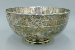 A silver plated horse bowl.
