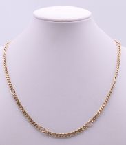 A 9 ct gold chain. 43 cm long. 15.1 grammes.