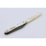 A 19th century mother-of-pearl combination quill cutter and letter opener. 12 cm long.