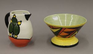 A Lorna Bailey vase and jug. The former 16.5 cm diameter.
