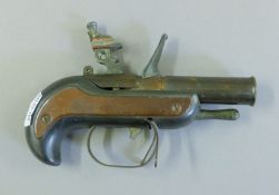 A Dunhill tinderbox gun lighter.