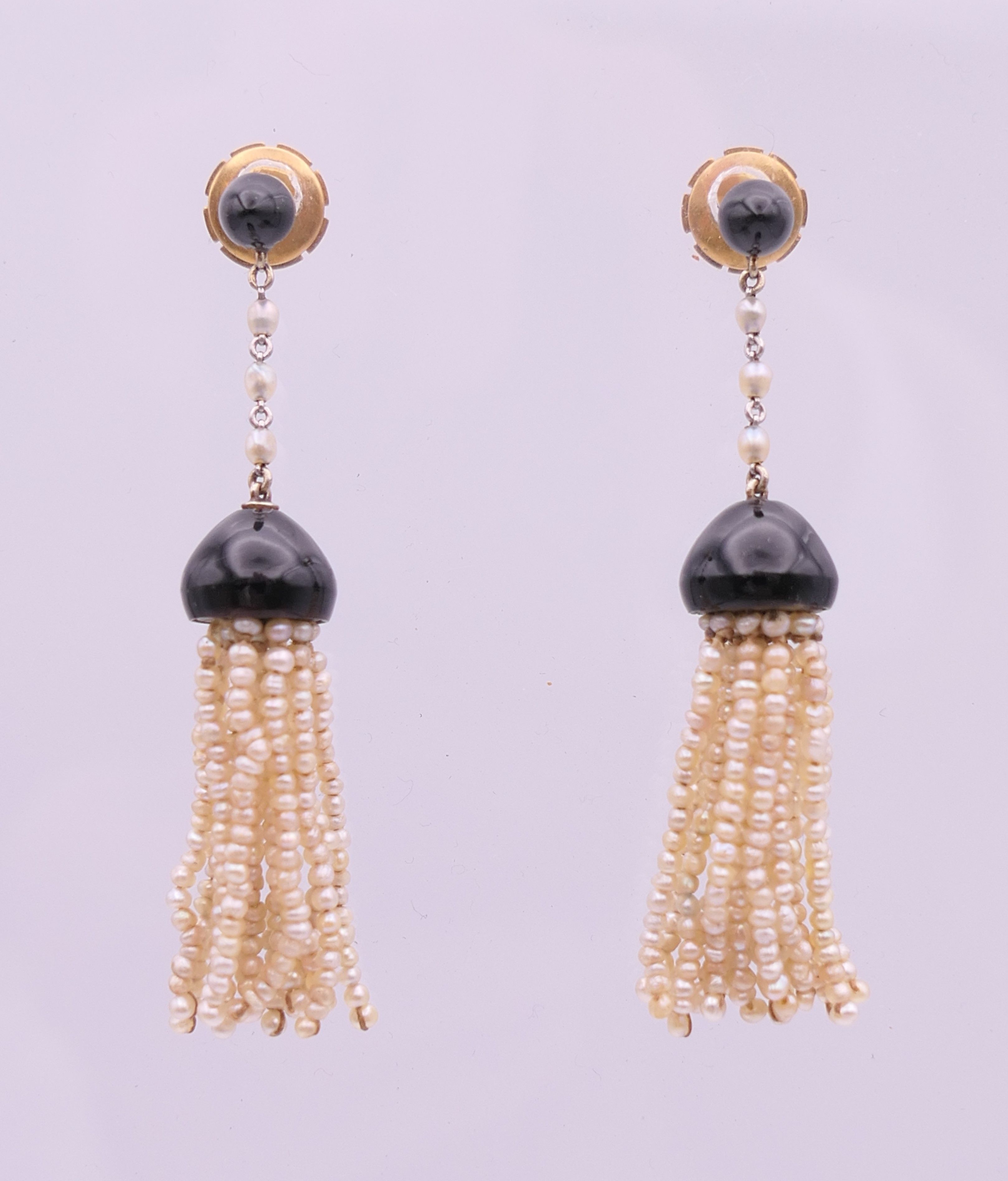 A pair of 18 ct gold seed pearl and enamel drop earrings. 5 cm high.