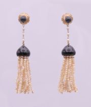 A pair of 18 ct gold seed pearl and enamel drop earrings. 5 cm high.