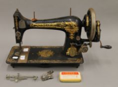 A Singer sewing machine. 50 cm long.