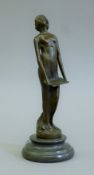 A small Art Nouveau style bronze model of a girl. 18 cm high.