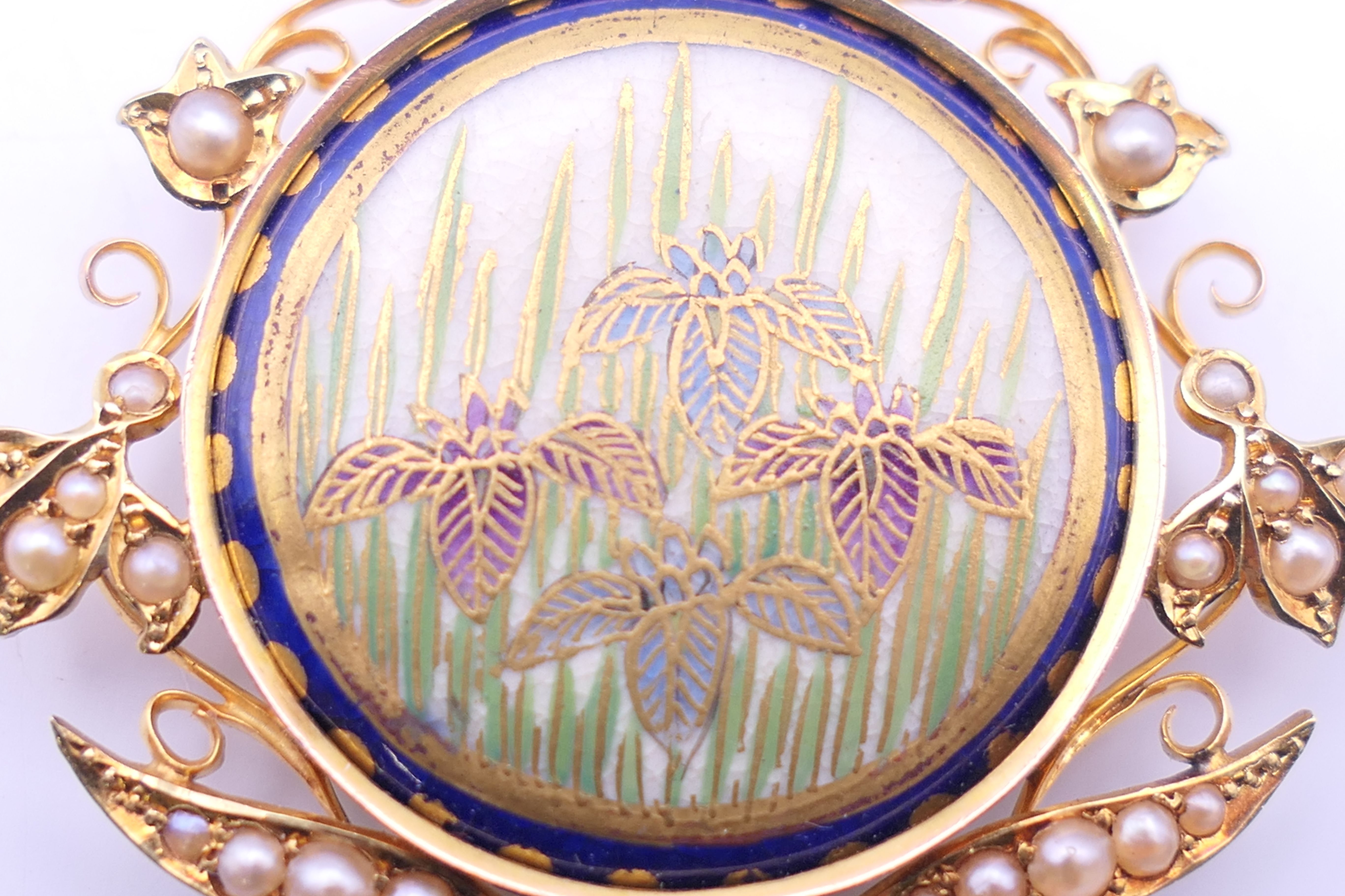 A gold and seed pearl pendant centred with a Satsuma porcelain plaque. 4 cm wide. - Image 3 of 13