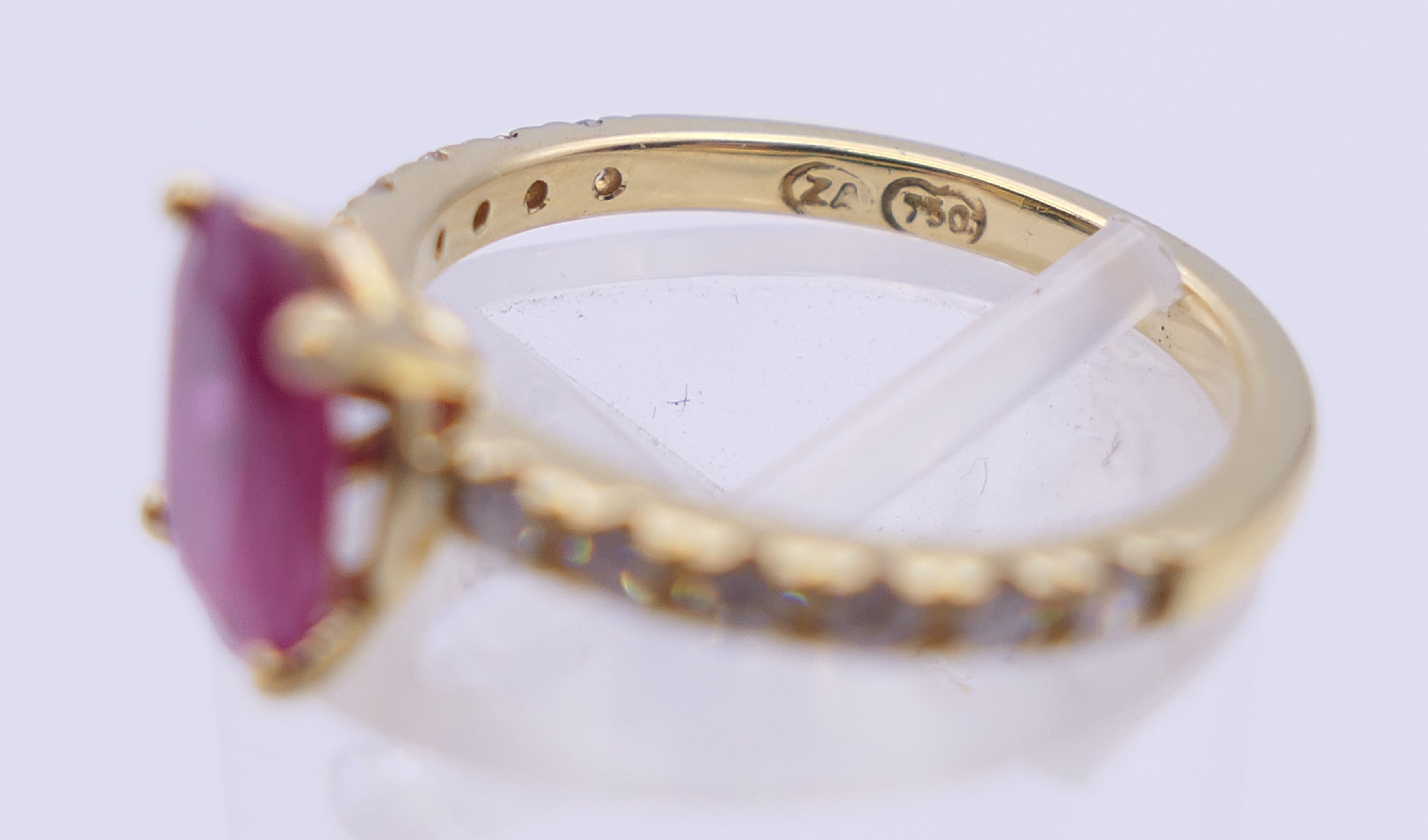 An 18 ct gold ruby and diamond ring. Ring size I. - Image 4 of 4